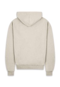 Hoodie in hellem Beige mit weicher Textur, gerippten Bündchen und Saum. Die Rückansicht zeigt ein schlichtes Design ohne Muster.