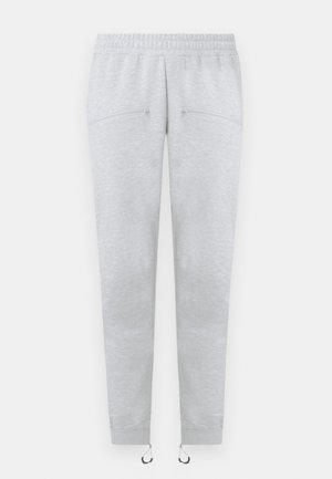 Pantalon de survêtement gris clair avec taille élastique, poches latérales zippées, chevilles resserrées et cordons réglables aux ourlets.