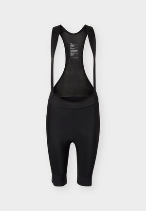 Cuissard de cyclisme noir avec panneau arrière en mesh et siège rembourré, conçu pour le confort et la performance.