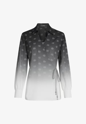 Blouse portefeuille à manches longues avec dégradé du noir au blanc, petit motif blanc, col et lien latéral à la taille.