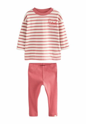 Striped long-sleeve top in white and pink with embroidered text, paired with solid pink leggings. Soft cotton material, relaxed fit.