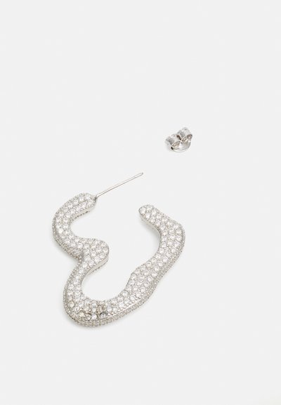 Silver snake-shaped earring encrusted with clear rhinestones, featuring a thin post and a small hook for secure attachment.