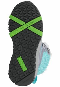 Suela de zapato con una superficie de goma negra texturizada, con acentos verdes, texto "ZONA FLEX" y una sección con un patrón turquesa.