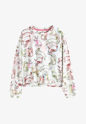 Biała bluza z nadrukiem zabawnych króliczków w kolorach różowym, żółtym i czarnym, z okrągłym dekoltem i długimi rękawami. Miękka faktura tkaniny.