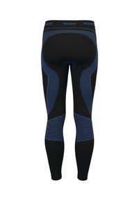 Black leggings with blue accents and striped patterns; stretchy, fitted design; Polar Husky logo on waistband; smooth, textured material.