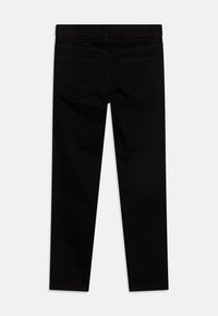 Lindex TROUSERS - Jeans a sigaretta - black