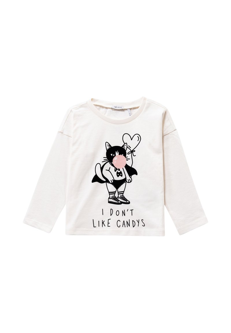 Maglietta a maniche lunghe bianca per bambini con un gatto dei cartoni animati che soffia una gomma da masticare rosa e tiene un palloncino a forma di cuore. Sotto c'è scritto "Non mi piacciono le caramelle".