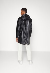 Rains LONG JACKET UNISEX - Parca - shinny black