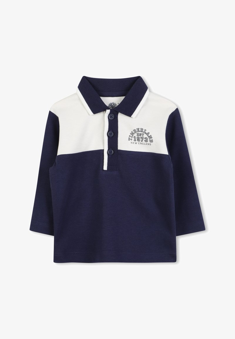 Marineblauwe longsleeve polo met witte kraag, drie knopen en geborduurd "Timberland 1973 New England" logo op de voorkant.