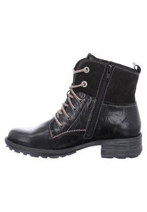 Black leather and suede ankle boot featuring a zip closure, laces, and a textured sole. Stitching details highlight the design.
