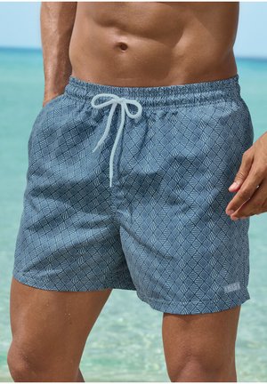 Shorts de bain bleus avec un motif géométrique, taille élastique et cordon de serrage. Fabriqués en matériau léger, conçus pour le confort.