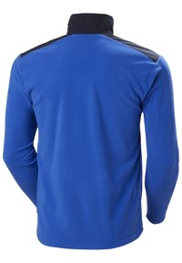 Blaues Fleece-Jackett mit langen Ärmeln, hohem Kragen und schwarzen Schulterakzenten. Glatte Textur, figurbetontes Design und leichtes Material.