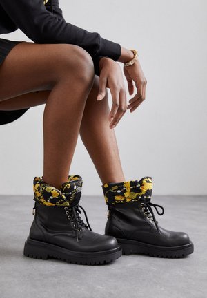 Platform ankle boots - black