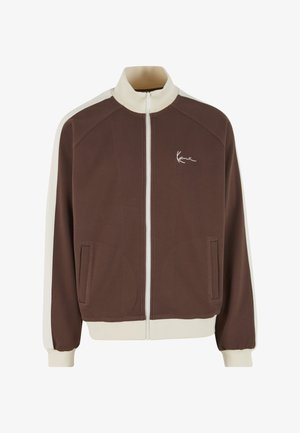 Braune Jacke mit Reißverschluss in Cremeakzenten, geripptem Kragen und elastischen Bündchen. Verfügt über seitliche Taschen und ein gesticktes Logo auf der Brust.