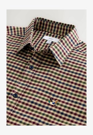 Ruuduline särk roheliste, siniste ja burgundia kvadratega, tumedate nööbiga ning tikandiga lendav prääksu part krae paremas allnurgas.