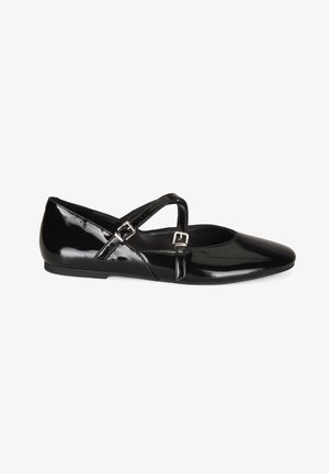 Black patent leather ballet flats with a pointed toe, featuring crisscross straps and silver buckle accents. Flat sole, smooth texture.
