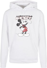 Fehér kapucnis pulóver, amelyen Mickey Mouse piros és fekete nyomtatott grafikája látható, elöl zsebbel és húzózsinórral.