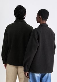 Tommy Jeans UNISEX czarny
