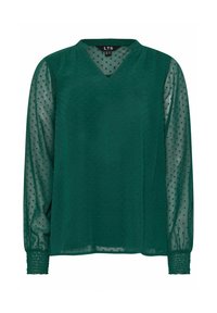 Blusa verde con scollatura a V, texture a pois e maniche lunghe trasparenti. I polsini presentano dettagli elastici arricciati per un look aderente.