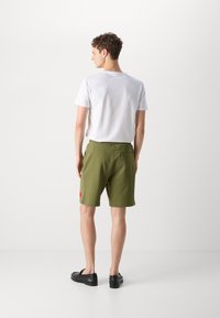 HUGO DIZ - Pantaloni de trening - open green