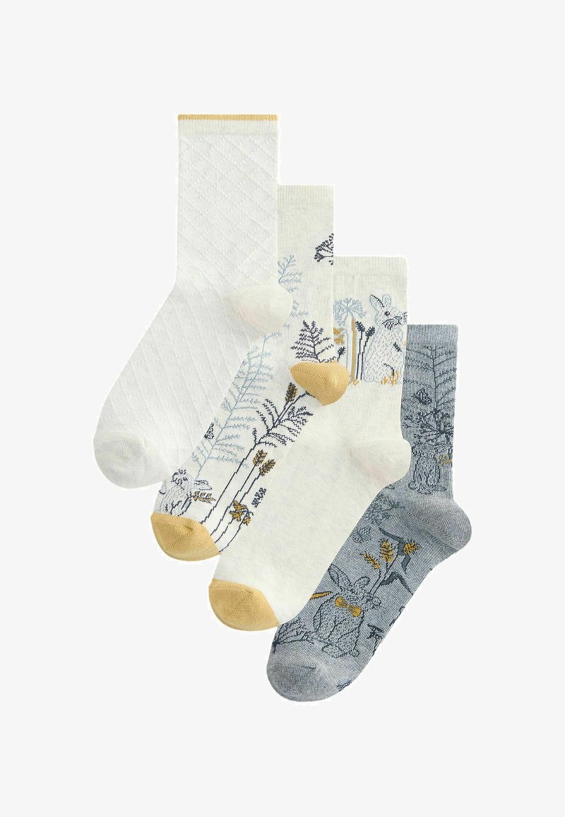 Vier Paar knöchelhohe Socken in Weiß und Grau mit naturinspirierten Designs, darunter Kaninchen und Pflanzen, einige mit kontrastierenden gelben Fersen und Bündchen.