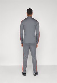 Nike Performance ACADEMY SET - Fato de treino - iron grey/dragon red