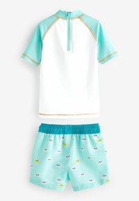 Next SUNSAFE SET - REGULAR FIT - Pantaloni de trening - green white smiles
