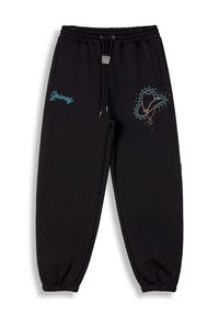 Pantalones jogger negros hechos de tela suave, con cinturilla elástica y cordón, bolsillos laterales y bordado colorido en el muslo izquierdo.