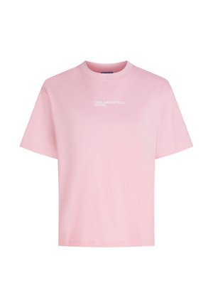 T-shirt en coton rose avec un col rond et des manches courtes. Texte "KARL LAGERFELD JEANS" imprimé en blanc sur la poitrine.