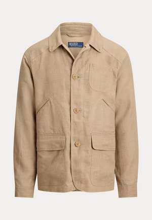 Beige Leinenjacke für Herren mit Kragen, drei vorderen Knöpfen, einer Brusttasche und zwei Klappentaschen auf Taillenhöhe.