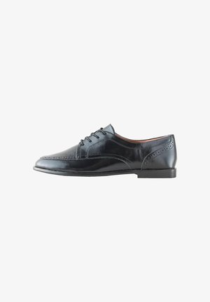 Black leather men's oxford shoe with brogue detailing and laces, shown in profile on a white background.