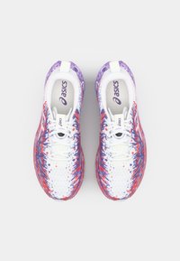 White running shoes with a gradient pattern of purple, red, and blue. Features a textured upper, flat laces, and a cushioned sole.
