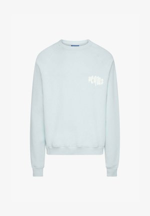 Világoskék kapucnis pulóver, raglan ujjakkal, bordás mandzsettákkal és aljjal, fehér "req.us" felirattal a bal mellrészen. Puha tapintás, laza kialakítás.