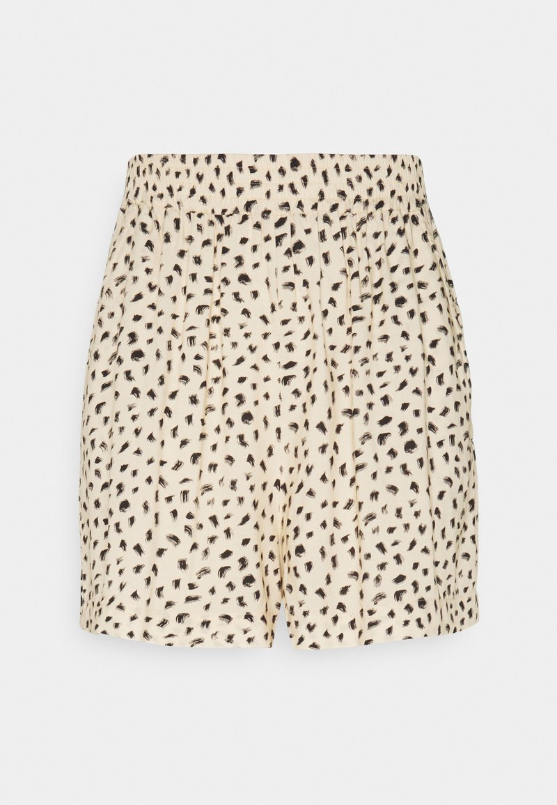 Béžové šortky s černými nepravidelnými skvrnami, s elastickým pasem a volným střihem, zobrazené na bílém pozadí.