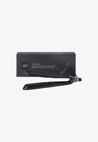 Lisseur professionnel ghd Chronos HD noir, réactif au mouvement, avec boîte d'emballage sur fond blanc.