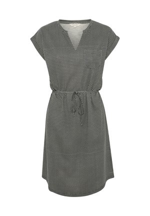 Black and white polka dot dress featuring a V-neckline, cap sleeves, and an adjustable drawstring waist. Made from lightweight fabric.