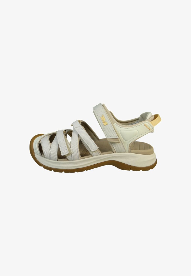 Hvide sandaler med justerbare remme, polstret sål, gummisål og en logoaccent. Har et elegant design og åben tå struktur.