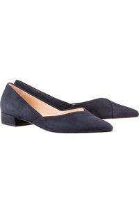 Navy suede low-heeled pumps with a triangular pointed toe, featuring a cut-out design along the top edge and a textured finish.