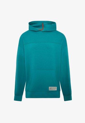 Teal hættebluse med en frontlomme, har en vandret sømdetalje på brystet og et mærke på den nederste side. Blød tekstur.