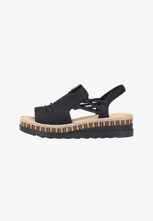 Sandalo nero con punta aperta, tomaia in pelle testurizzata e design con fasce incrociate. Presenta una piattaforma in juta con accenti a strisce.
