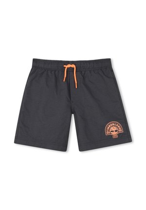 Shorts à taille élastique noire avec cordon orange et logo Timberland imprimé en orange sur la partie inférieure gauche de la jambe.