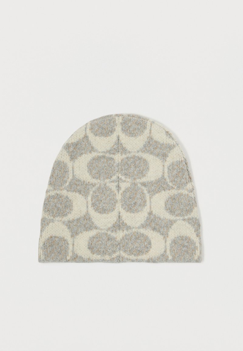 Grey and cream knit beanie featuring a textured circular pattern, rounded top, and soft fabric. No visible branding or embellishments.