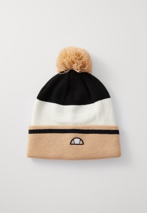 Gorro de punto en negro, blanco y beige con un pompón marrón en la parte superior y un pequeño logo bordado en el puño. Textura suave, ajuste ceñido.