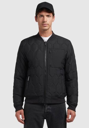Black quilted bomber jacket with a hexagonal pattern, zip front, and ribbed cuffs. Features a chest pocket and a solid black design.
