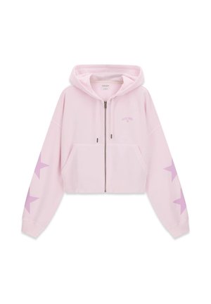 Jasnoróżowa krótka bluza z kapturem na zamek, z kapturem, przednimi kieszeniami i fioletowymi gwiazdami na obu rękawach.