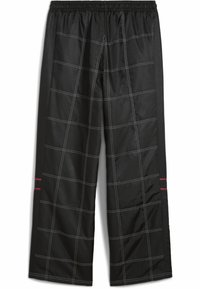 Pantaloni atletici negri dintr-un material neted, cu un model de tip plasă în cusături albe și o dungi roșie pe lateral. Curea elastică la talie.