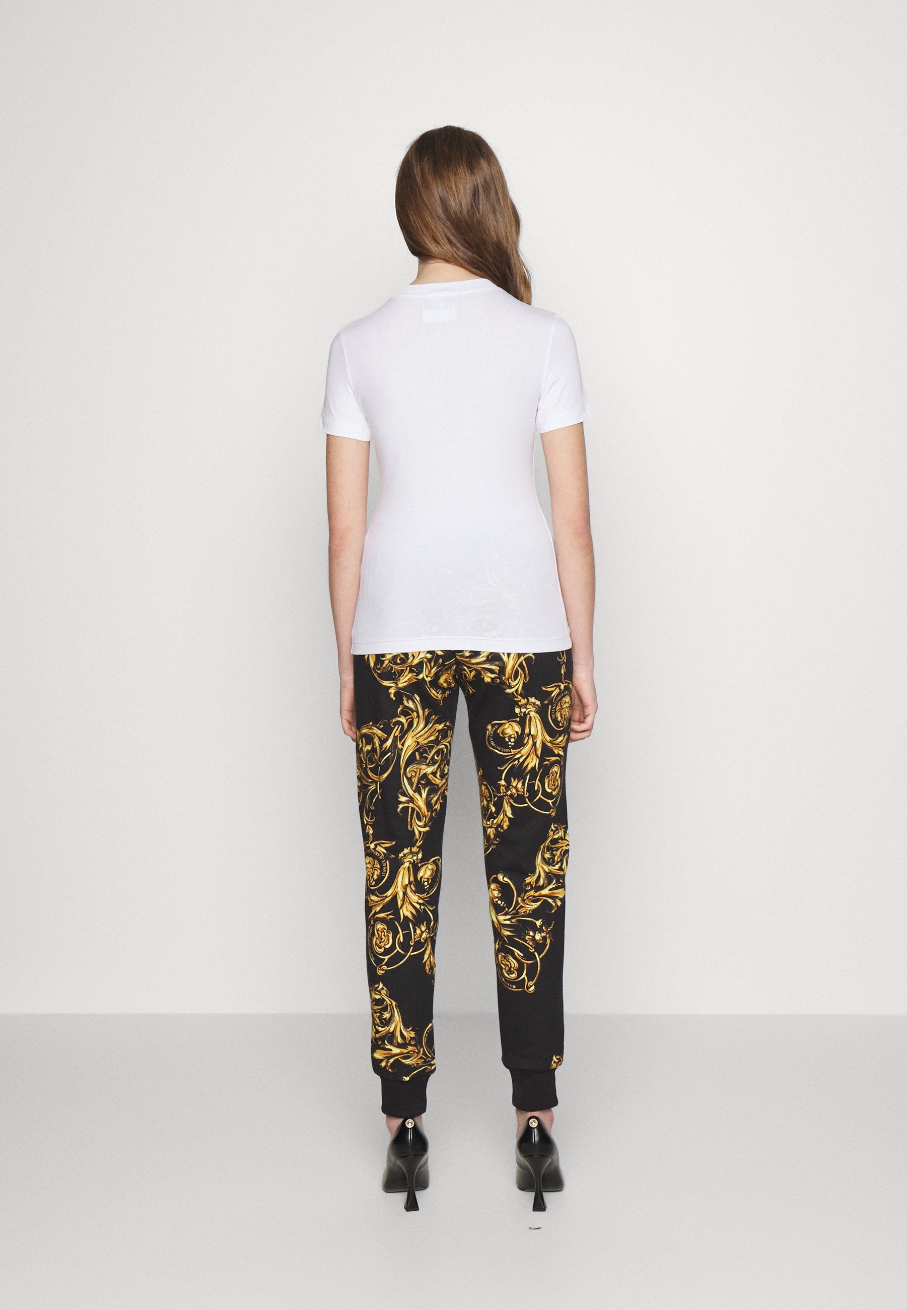 versace stretch pants