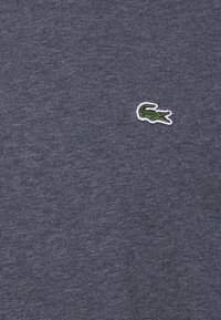 Lacoste Paprasti marškinėliai - pitch chine
