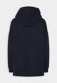 Sweat à capuche bleu marine avec une poche avant, une coupe ample et une grande capuche. Texture lisse avec des poignets et un ourlet côtelés.