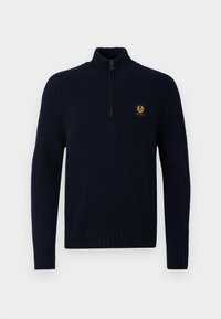 Pulover tricotat bleumarin cu guler înalt, fermoar pe jumătate și manșete nervurate. Prezintă un mic logo auriu pe piept. Textură netedă.